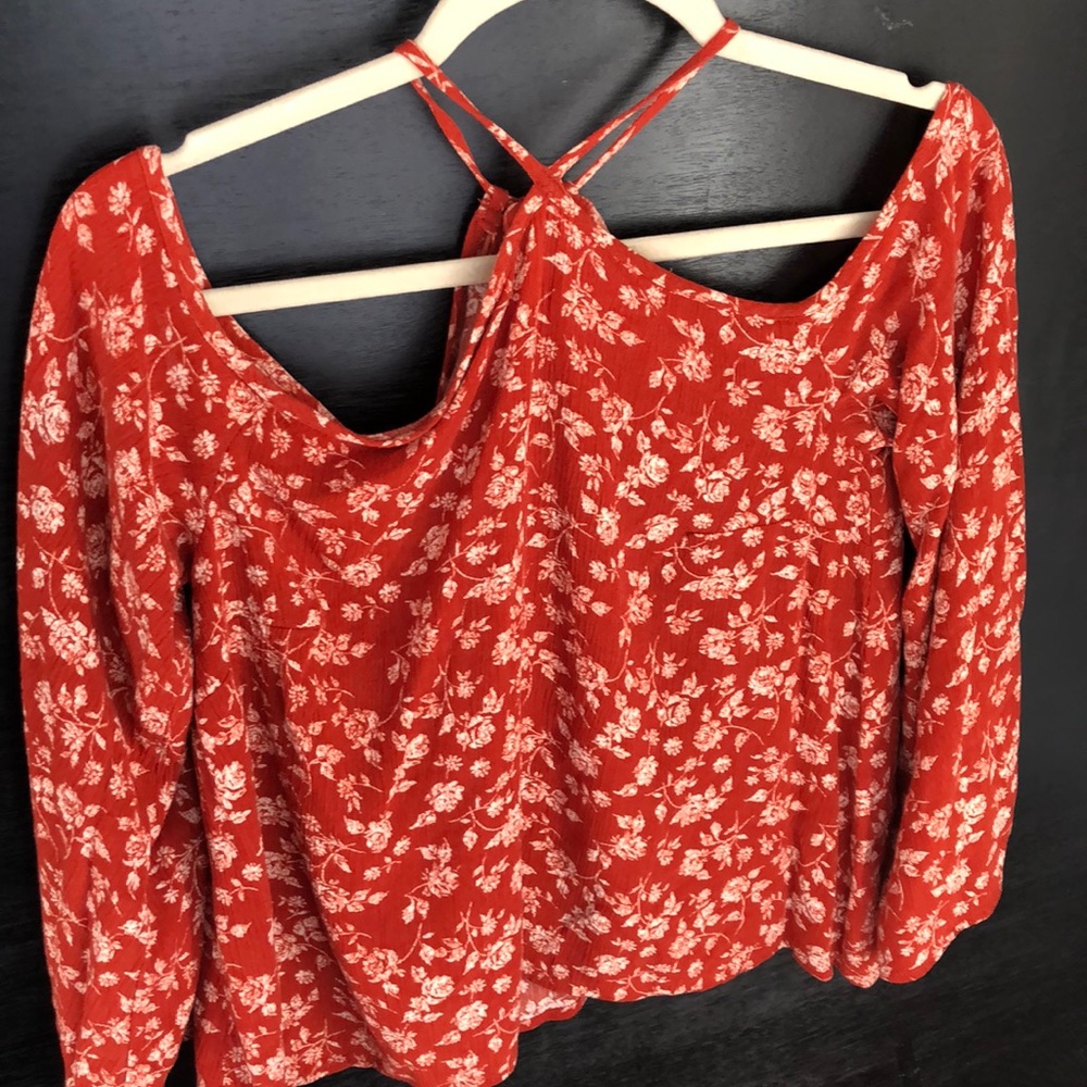 Orange floral blouse